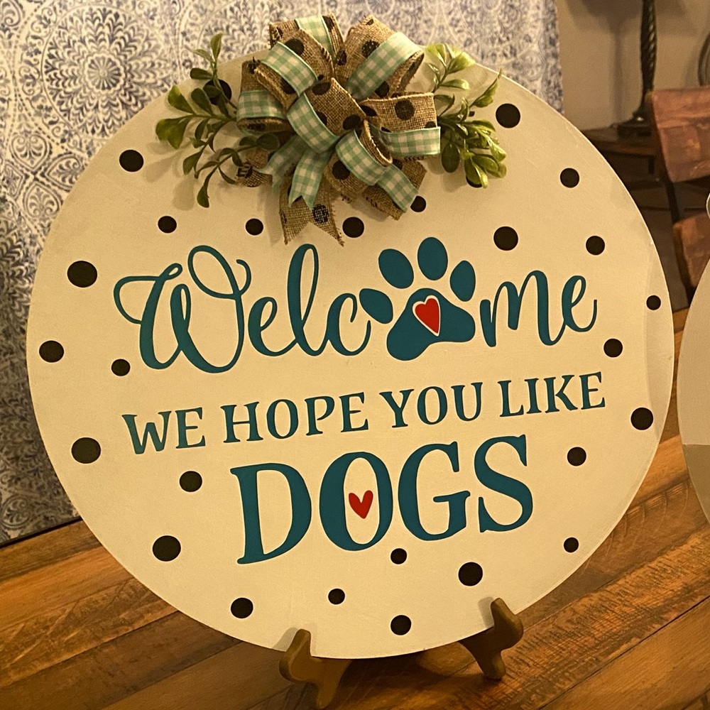 Welcome we hope you like dogs round door hanger